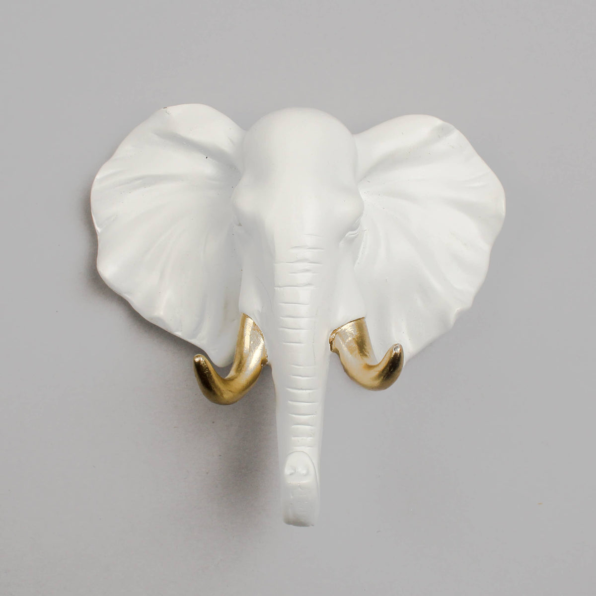 TRUNK CALL — white resin elephant head wall hook with gold tusk detail | Hang Ups | Missy K